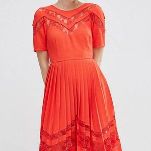 Red pleated dress